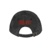 Back view of a black washed Imagine Dragons hat with red embroidered "Imagine Dragons Origins" anniversary text above the adjustable strap.